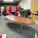 Large Walnut Effect Oval Meeting Room Table