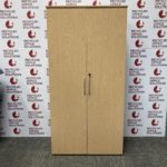 Tall Oak Effect Storage Cupboard