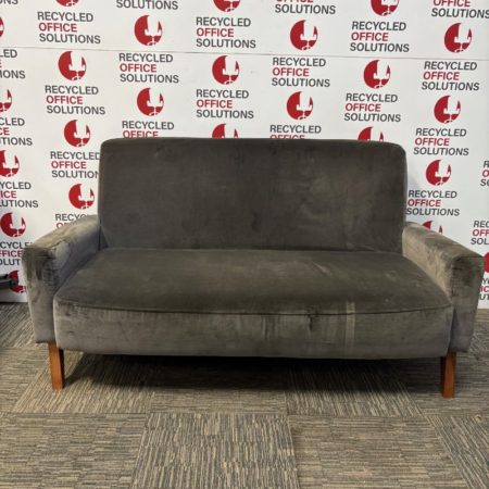 grey velvet two-seater sofa with wooden legs