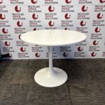 White Round table With A White Base
